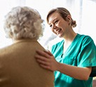 Resident of Covenant Living of Colorado with nursing staff