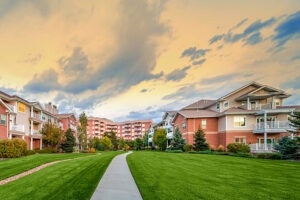 Manicured lawn outside of residential living apartments