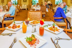 Table at restaurant with food and drinks